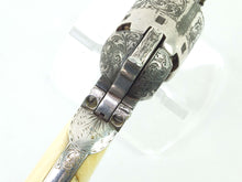 Load image into Gallery viewer, Gustave Young Engraved Fourth Model 1851 Navy Colt Percussion Nickel & Silver Plated Revolver. SN 8717