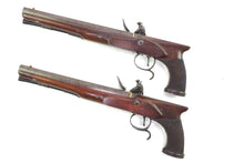 Load image into Gallery viewer, Flintlock Saw Handled Duelling Pistols by H.W. Mortimer & Son, very fine cased pair. SN 8964