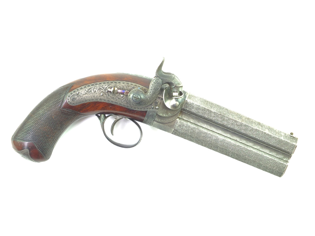 A Very Fine Cased Irish Over and Under Percussion Pistol by Trulock. S ...