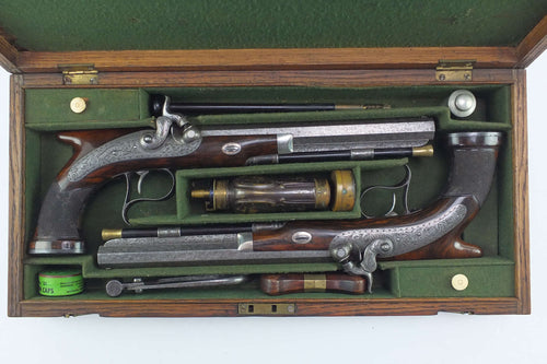 Saw Handled Percussion Duelling Pistols by W. & J. Rigby, very fine cased pair. SN 8896